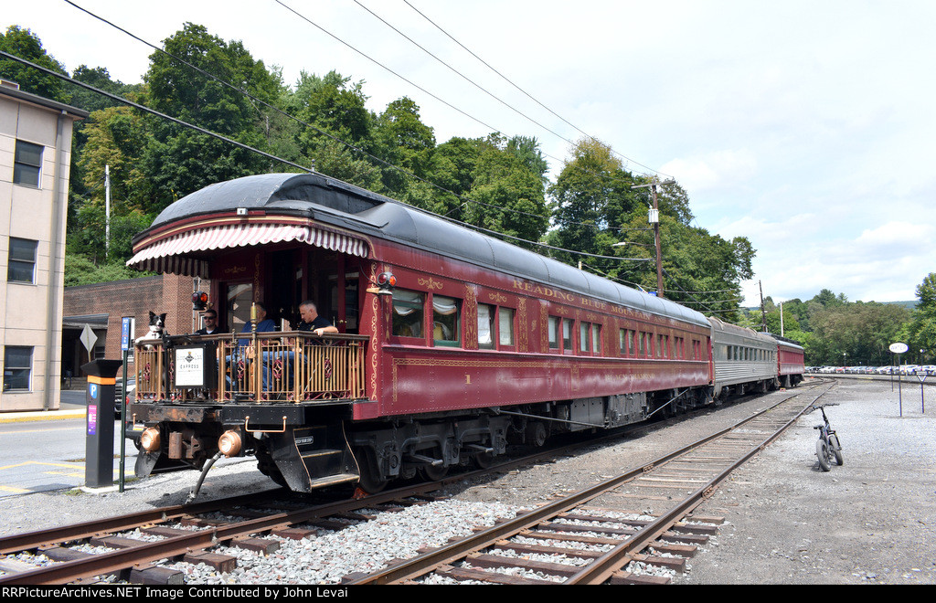 The Black Diamond and some other private cars rest just north of the Jim Thorpe Station. The president of the RBM&N, Andy Mueller, was sitting on the deck of the RBM&N at the time and I complimented him on not only the operation of the 2102 excursion, but